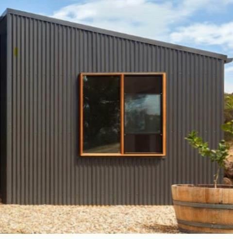 Corrugated steel garden building